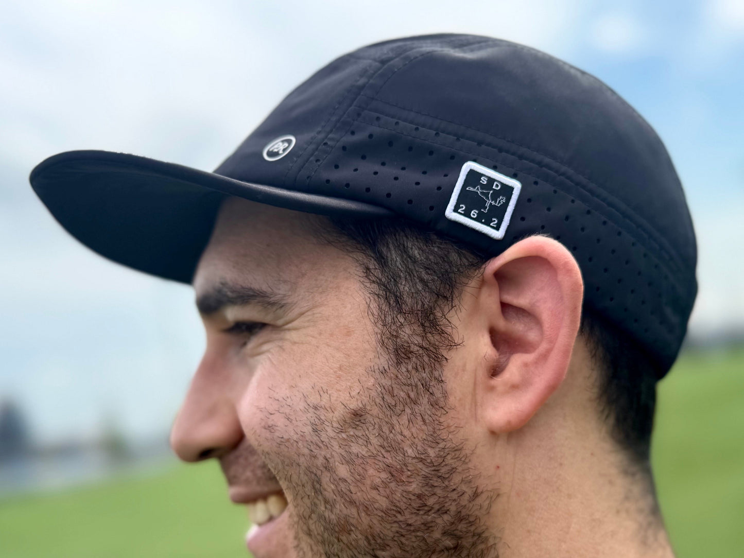 San Diego marathon badge on black hat